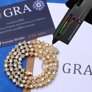 S925 zilveren moissanite sterrenketting met GRA-certificaat en tester op blauwe achtergrond