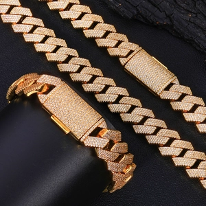 Chunky 15mm gold Cuban link chain necklace and bracelet set with icy pavé diamonds