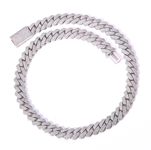 Detailed view of 15mm silver Cuban link chain with four rows of sparkling rhinestones