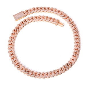 Detail of 15mm rose gold Cuban link necklace featuring dense white zircon pave setting