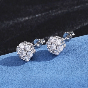 Macro view of S925 sterling silver moissanite flower earrings with butterfly clasp
