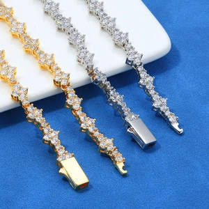 Pulsera tennis de 6,5 mm con eslabones de cruz de circonitas en oro y plata