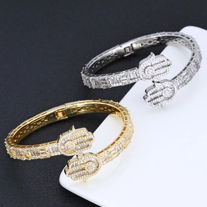 Hamsa Hand hip hop bracelets in gold and silver finish with pave-set cubic zirconia stones