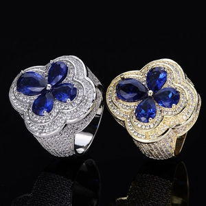Luxurious S925 silver blue moissanite flower rings with gold and silver bands