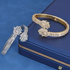 Hamsa Hand hip-hop bracelets in gold and silver finish with micro-paved cubic zirconia