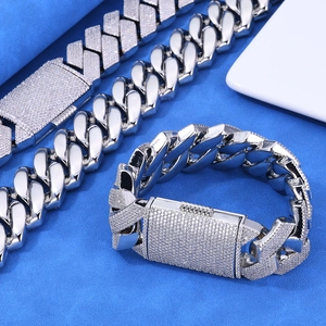 Close-up of hip-hop 925 silver moissanite Cuban link bracelet with iced out pavé details