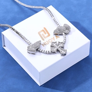 Iced out hip hop necklace featuring prayer hands cross pendant on silver tennis chain