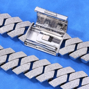 Close-up of S925 sterling silver iced-out cuban link chain with box clasp mechanism
