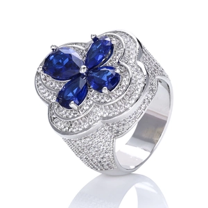 Luxury S925 silver blue flower ring with moissanite and micro-pave hip-hop design