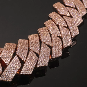 Macro shot of rose gold hip hop Cuban link chain with detailed pave-set cubic zirconia