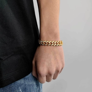 12mm gold Cuban link bracelet for men with double row cubic zirconia on model wrist