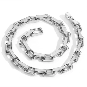 Macro view of high-polished 9mm silver stainless steel rectangular link chain for men