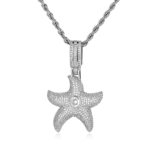 Detailed view of starfish pendant with pavé set cubic zirconia on a classic rope chain