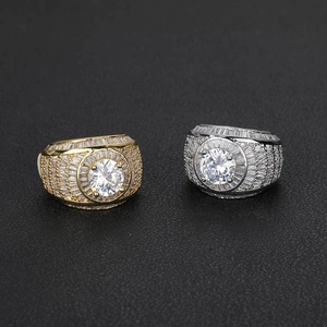 Luxury iced out hip hop rings in gold and silver with large round center stones