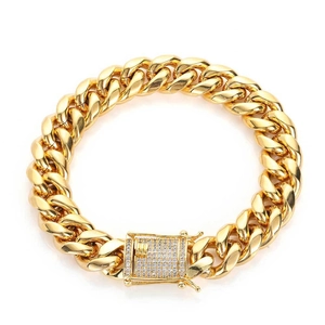 Iced out gold Cuban link bracelet for men with rhinestone paved clasp in hip hop style