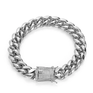 Close-up of hip hop silver Cuban chain bracelet with iced out square diamond clasp