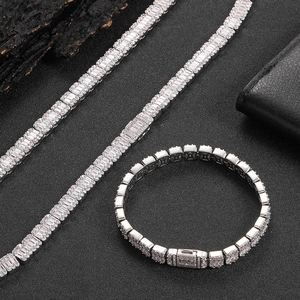 Macro shot of 8mm silver hip hop necklace and bracelet set with baguette-cut zircon