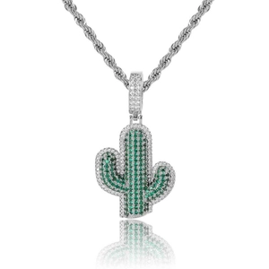 Detailed close-up of a silver cactus pendant with sparkling green and white cubic zirconia