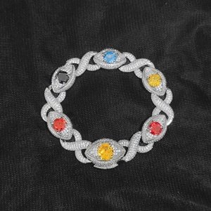 Macro detail of iced out cuban link bracelet with colorful marquise-cut zircons and diamonds