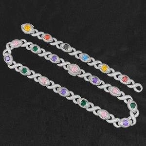 Close-up of rainbow tennis necklace and bracelet set with colorful stones in silver finish