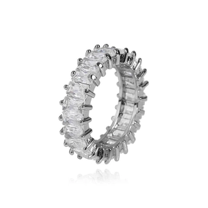 Macro view of 6mm silver eternity ring featuring baguette-cut cubic zirconia stones