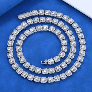 Macro detail of 7mm silver tennis chain with brilliant zircon stones and secure clasp
