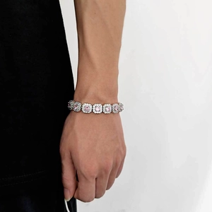 Close-up of pink cubic zirconia octagonal link iced out hip hop bracelet on wrist