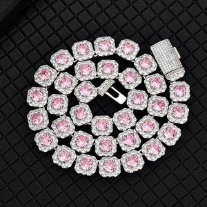 Detailed macro view of 12mm hip hop chain with pink zircon stones and paved crystals