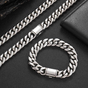 Detail view of the polished stainless steel Cuban link chain with a secure press clasp buckle