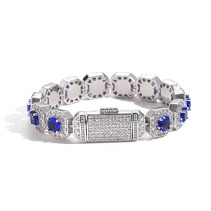 Luxurious 12mm silver cuban link bracelet with deep blue zircons and white pave stones