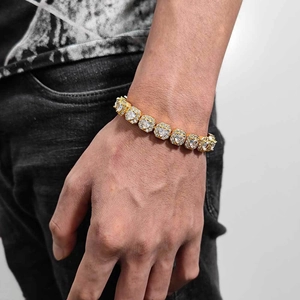 Macro shot of gold hip hop tennis bracelet with 10mm zircon heart and iced out diamonds