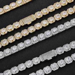 Close-up of 18K gold and silver hip hop necklaces with micro-paved zircon crystals