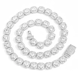Macro detail of silver heart tennis chain necklace with CZ stones and clasp