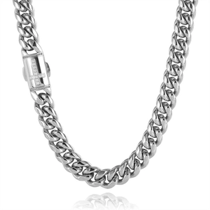 Detailed view of silver curb chain with micro-pave zircon cross pattern on the box clasp