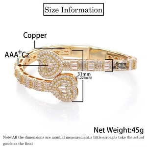 Detail view of gold heart bracelet with AAA+ cubic zirconia in punk hip-hop style