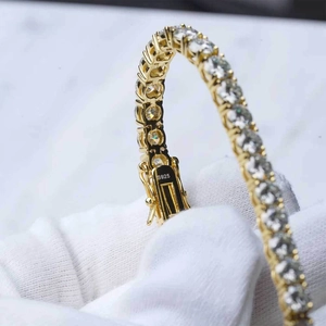 Close-up of S925 sterling silver tennis bracelet with round brilliant-cut moissanite stones