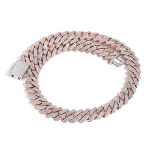 Detail of 18mm two-tone silver and rose gold cuban chain with paved zircon crystals