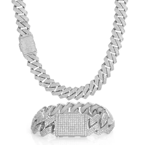 Detail view of iced out Cuban link necklace and bracelet set with triple row zircons