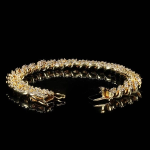 Macro shot of 9mm gold-plated hip hop tennis bracelet with rows of brilliant zircons