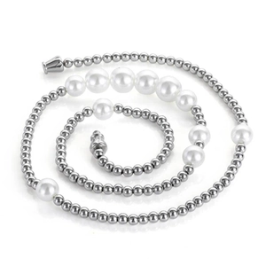 Macro view of multi-layer hip hop necklace with steel beads and gradient pearls