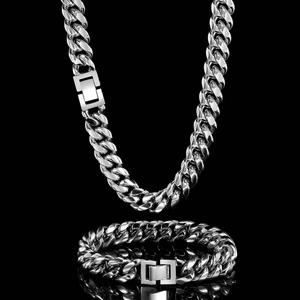Polished silver Cuban link chain necklace and bracelet set with square clasp detail