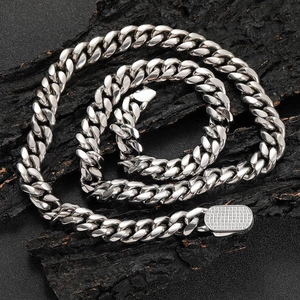 Polished silver stainless steel Cuban link chain with a sparkling pavé zircon clasp