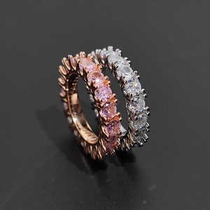 Hip hop 4mm eternity ring with single row cubic zirconia in rose gold and silver finishes