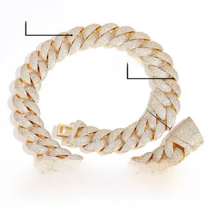 Close-up of 24mm wide golden cuban link necklace with zircon micro-pave setting