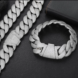 Close-up of hip-hop iced-out 24mm Cuban link necklace and bracelet set with cubic zirconia