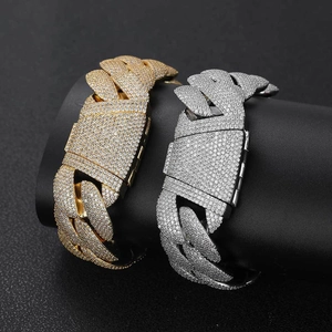 Iced out 24mm bubble Cuban link bracelet with sparkling cubic zirconia in gold and silver