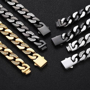 Iced out 12mm Cuban link chain bracelet in gold, black, and silver stainless steel finishes