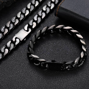 Detail of 12mm black stainless steel Cuban chain necklace with sparkling zircon pavé