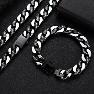 Detail of 12mm stainless steel Cuban link chain with inlaid zircons and square clasp