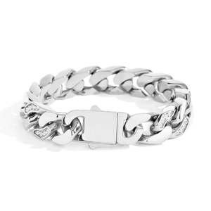 Detailed macro view of 12mm stainless steel Cuban chain bracelet with cubic zirconia paving